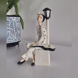 Figurine of Pierrot with a guitar